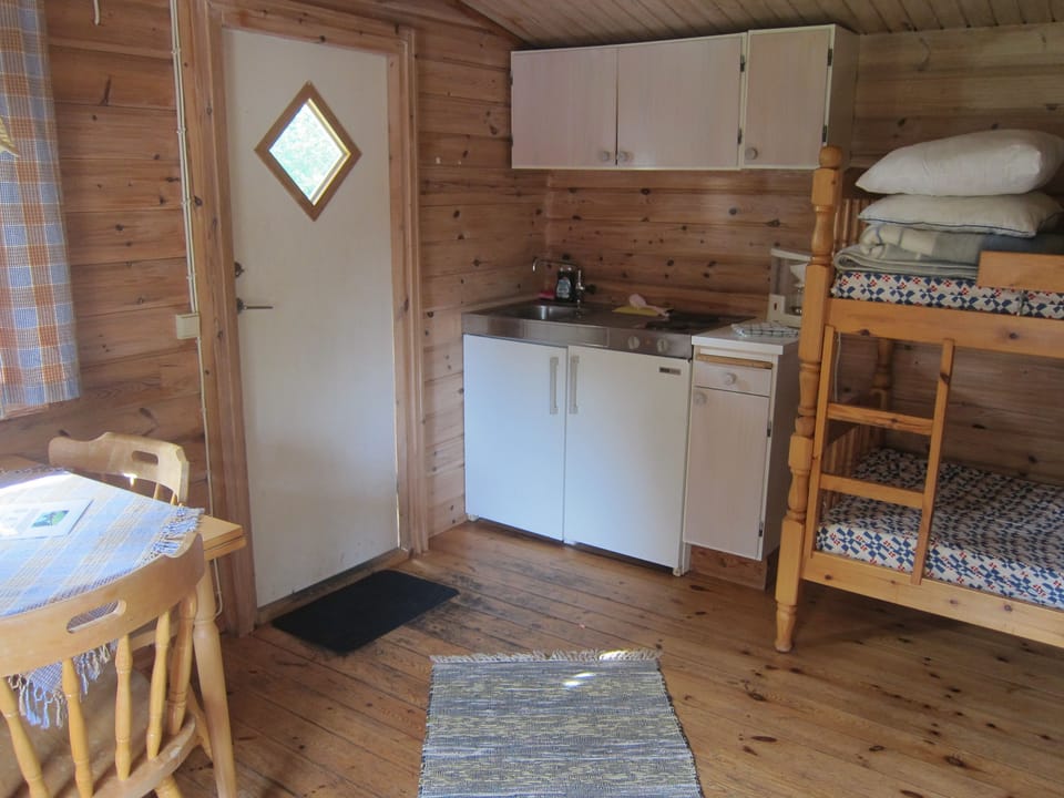 Basic Cabin, Shared Bathroom | Private kitchen | Fridge, stovetop, coffee/tea maker, cookware/dishes/utensils