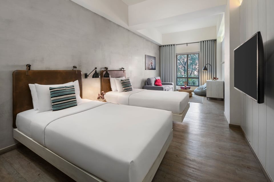 Suite, 2 Twin Beds | Pillowtop beds, in-room safe, desk, free WiFi