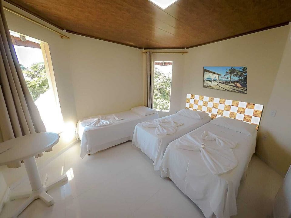 Superior Triple Room | Minibar, in-room safe, bed sheets