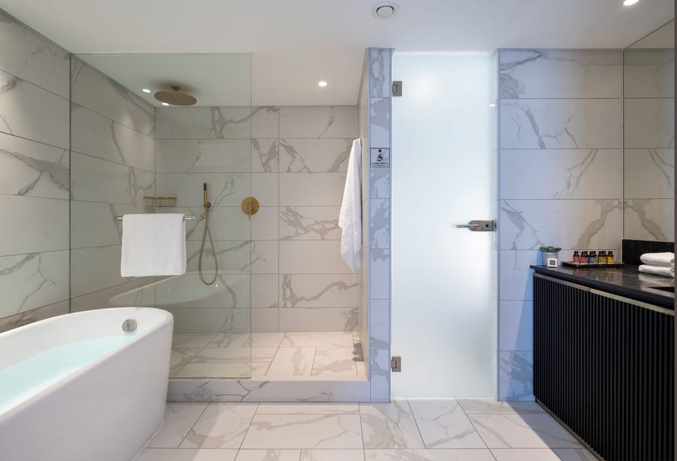 Presidential Double Room, 1 King Bed | Bathroom | Hair dryer, slippers, towels