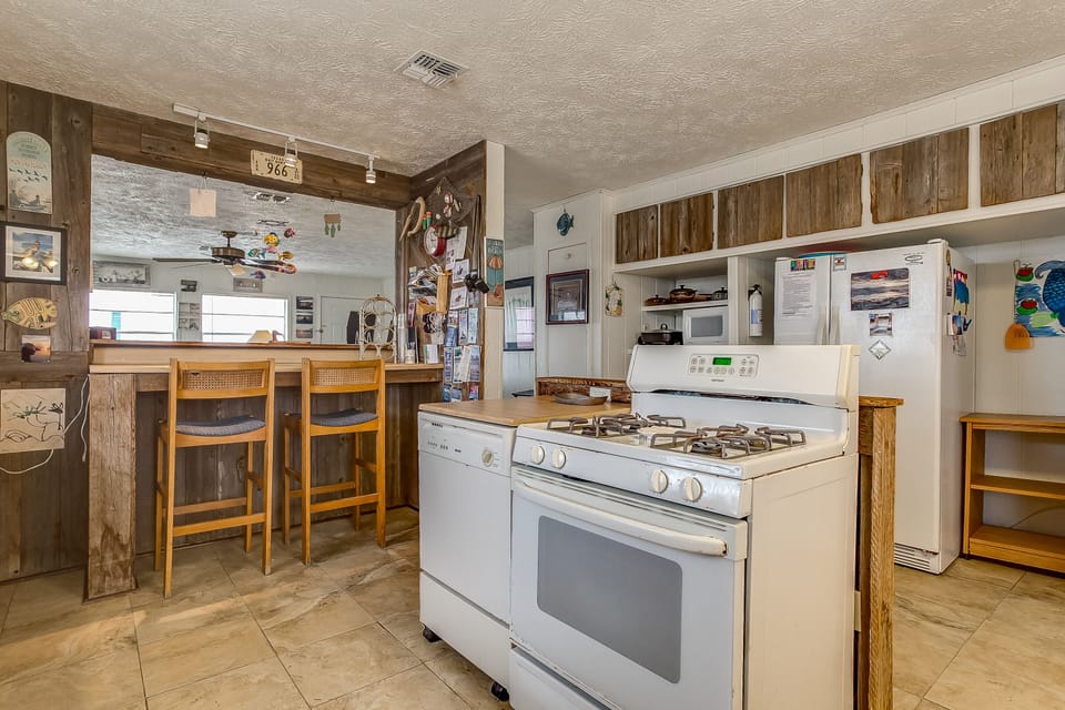 Kitchen bar has a view of the Laguna Madre and is a great location to work from.