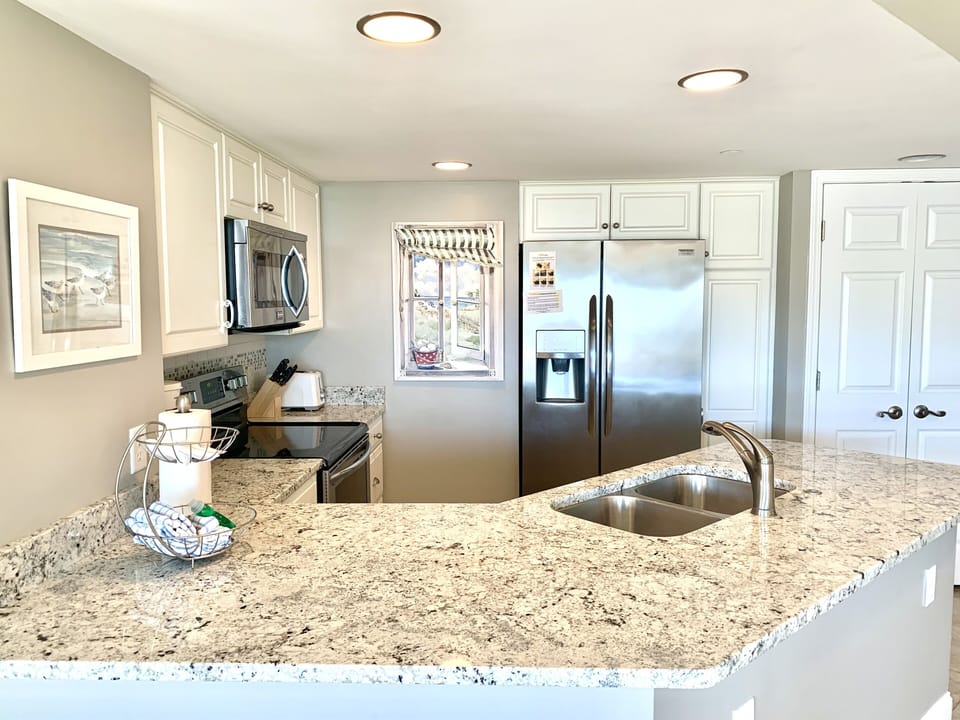 Open Concept Kitchen to the Living Area with a  Beach View!