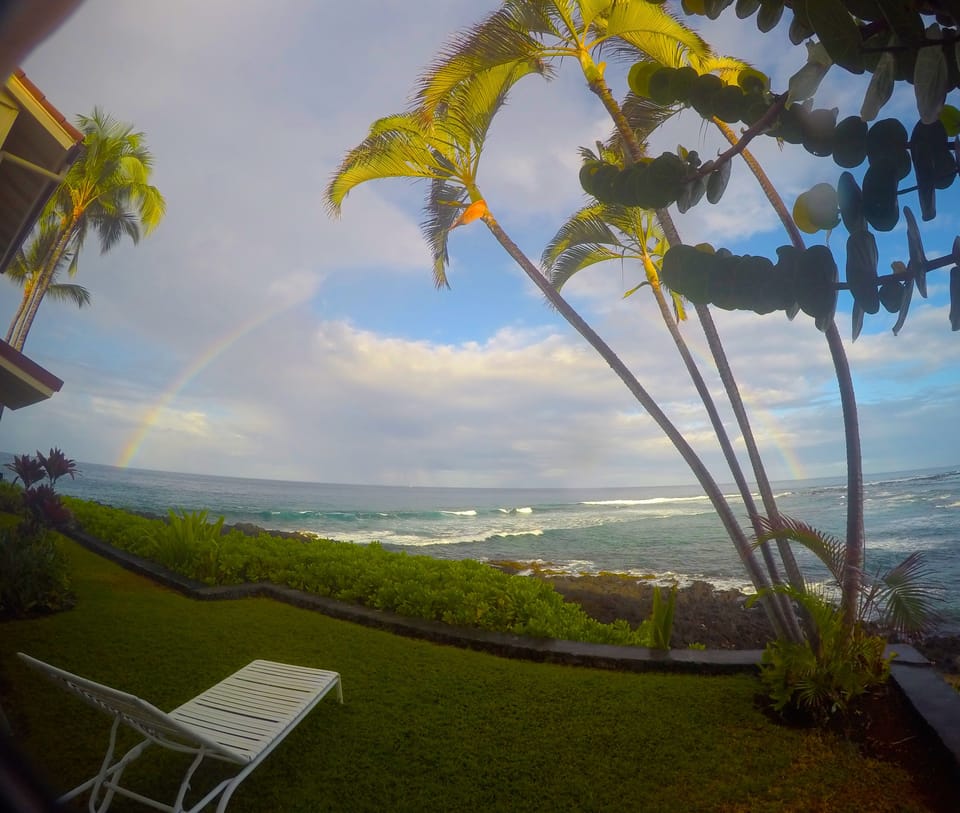 Misty sunrise & full rainbow over our bay
