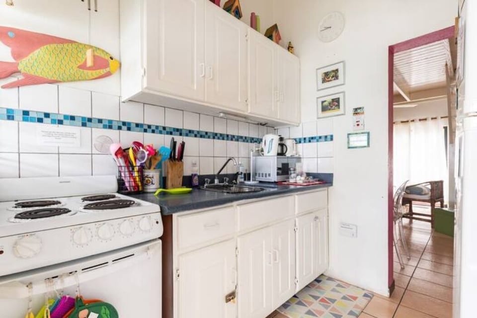 Fully equipped kitchen with stove, microwave, French press, and all easentials.