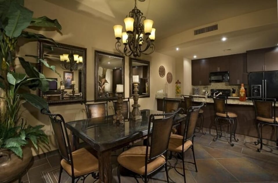 Spacious dining room features a custom hand-carved table.
