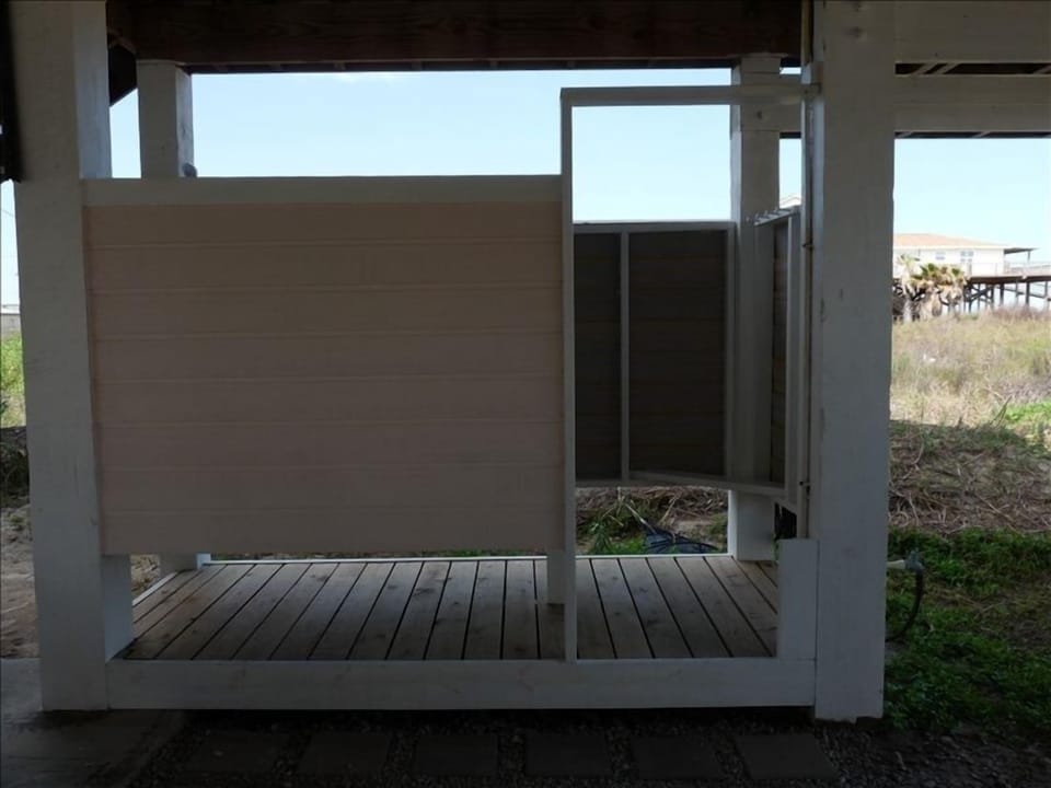 Large private external shower with hot and cold water