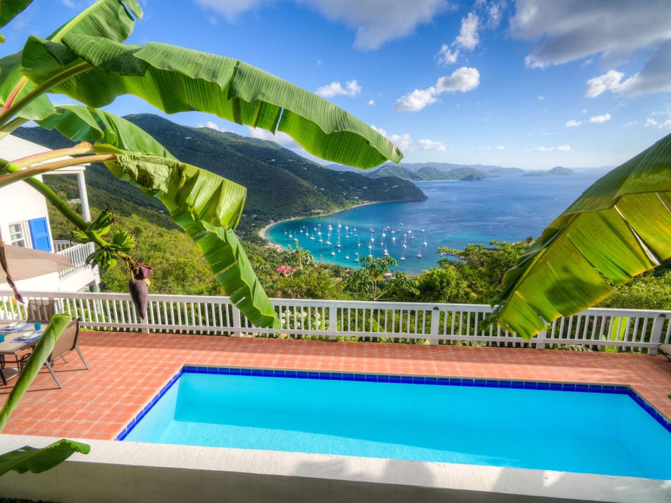 Makere sun terrace and pool looking down over Cane Garden Bay.