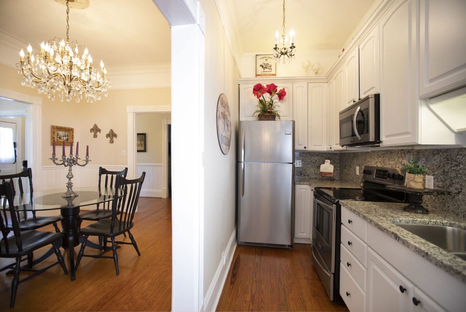 Kitchen is complete with a full-size suite of appliances including dishwasher