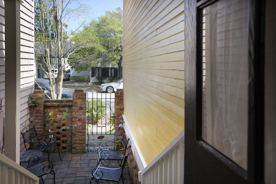 Step out of the kitchen/dining area into the courtyard