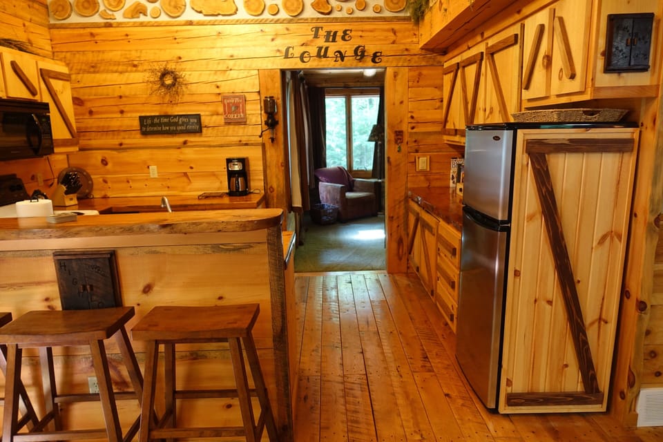 Fully stocked kitchen with handcrafted accents and artistic flair