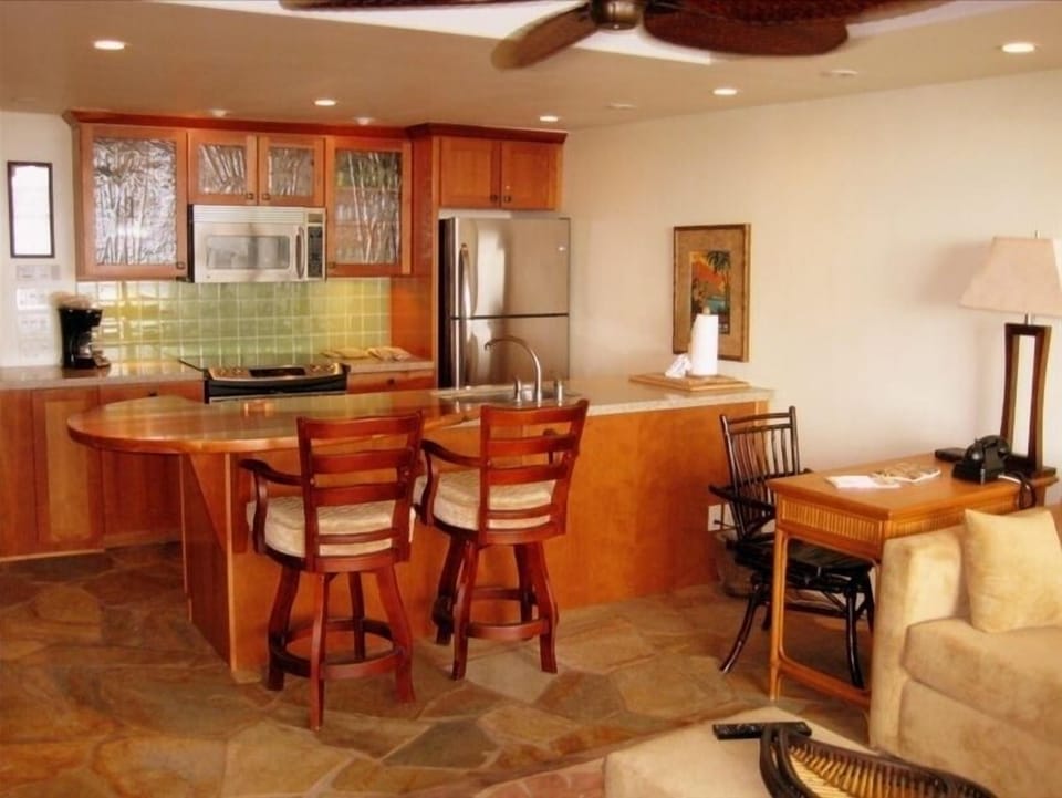Rich cherry wood adorns the entire condo.
