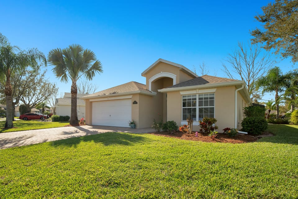 House front with House number plaque to right of garage