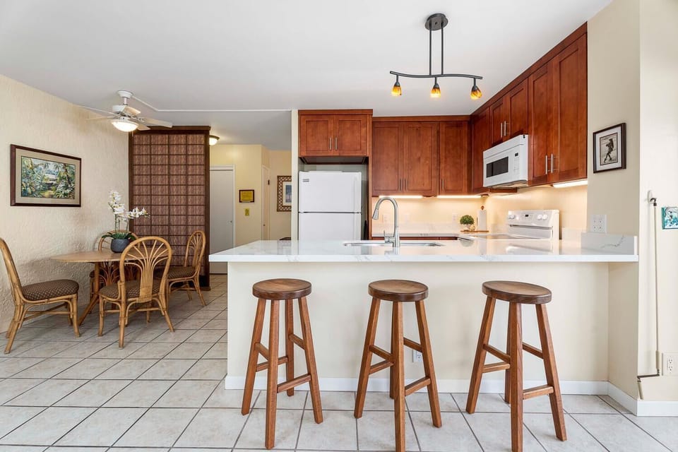 Dining spaces and newly renovated kitchen.
