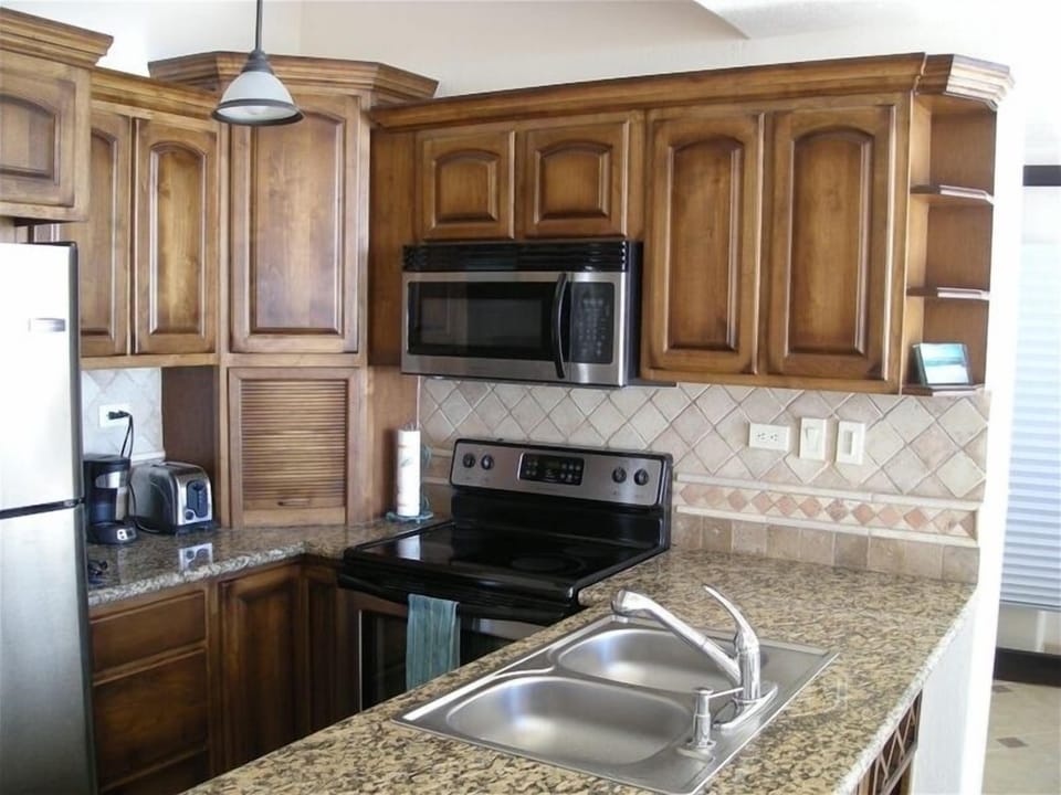 Well equipped kitchen; stainless steel appliances