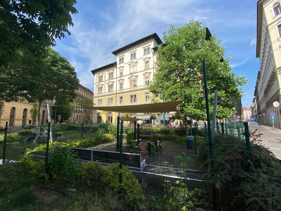 Our building with the small playground in front of it