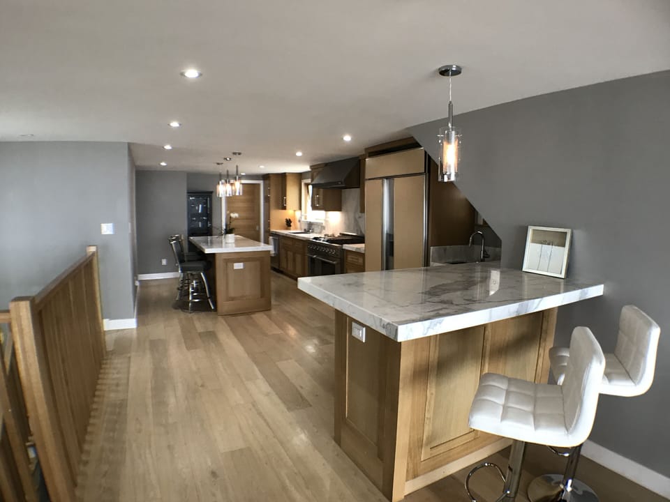 Open kitchen with white marble