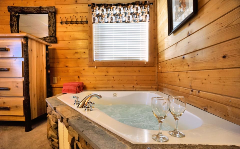The bear bedroom is a king suite on the main floor with an attached bathroom.
