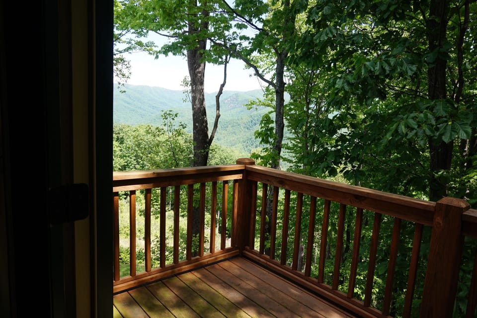 The peaceful and private mountain view balcony off the master suite