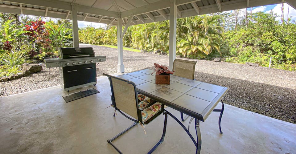 North Lanai with outdoor dining and gas-fired BBQ.