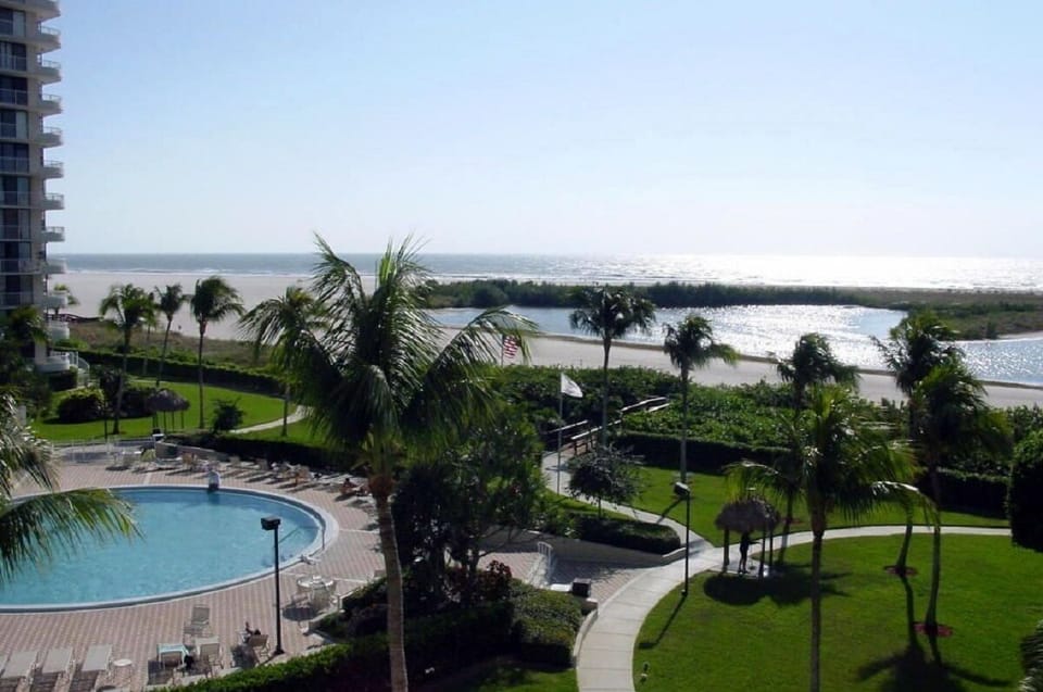 View from the balcony, pool and gateway to the beach.