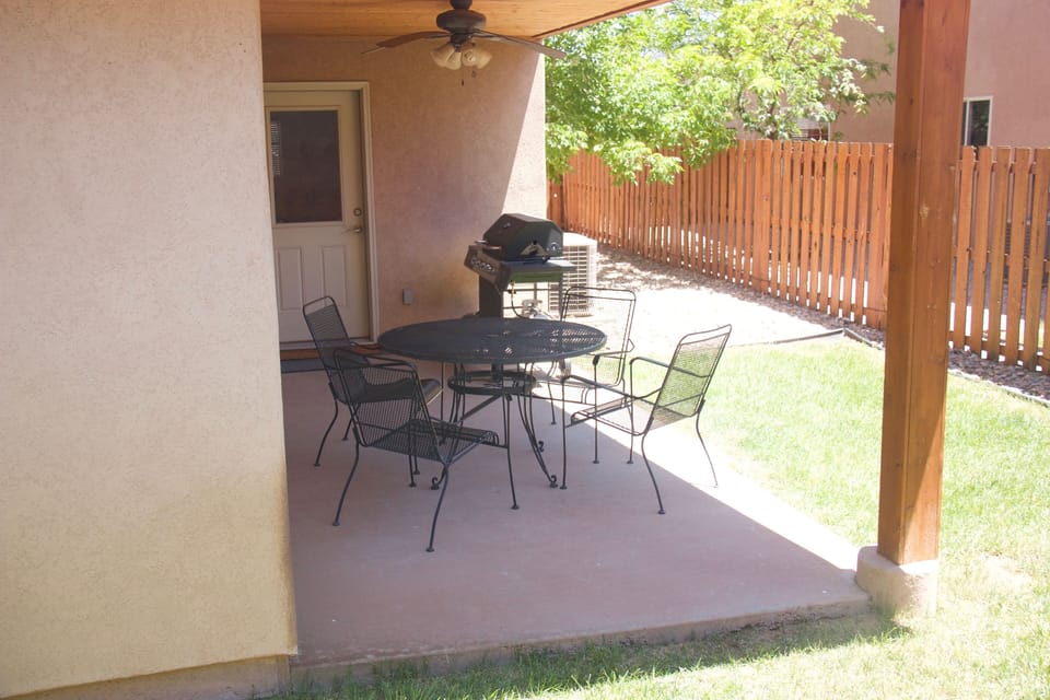 Outside patio with table and BBQ