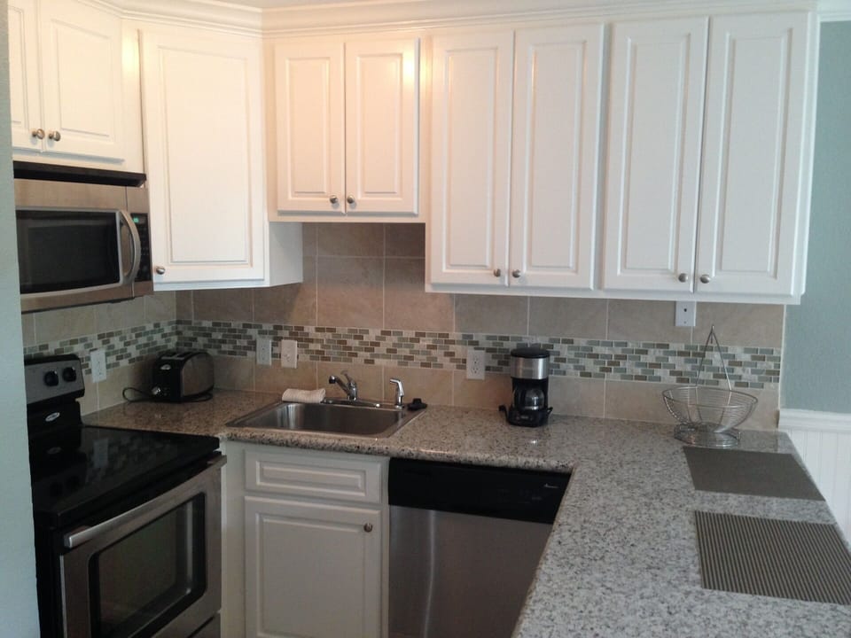 Newly Remodeled kitchen with granite and stainless steel appliances