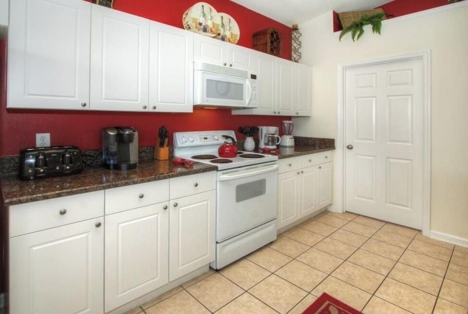 Kitchen stocked with appliances including Keurig Coffee Maker, Toaster, Blender