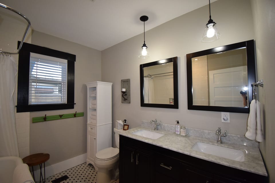 Main Bath: great for sharing with a double vanity, linen cabinet, & clawfoot tub