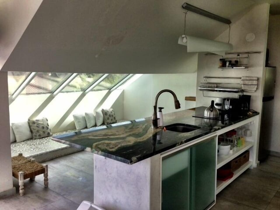 kitchen, see the mattresses behind where two more people can sleep