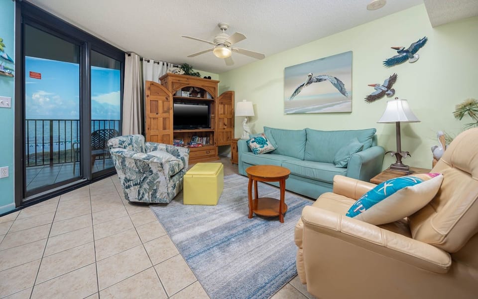 Living area looking out at the Gulf and a Sleper Sofer