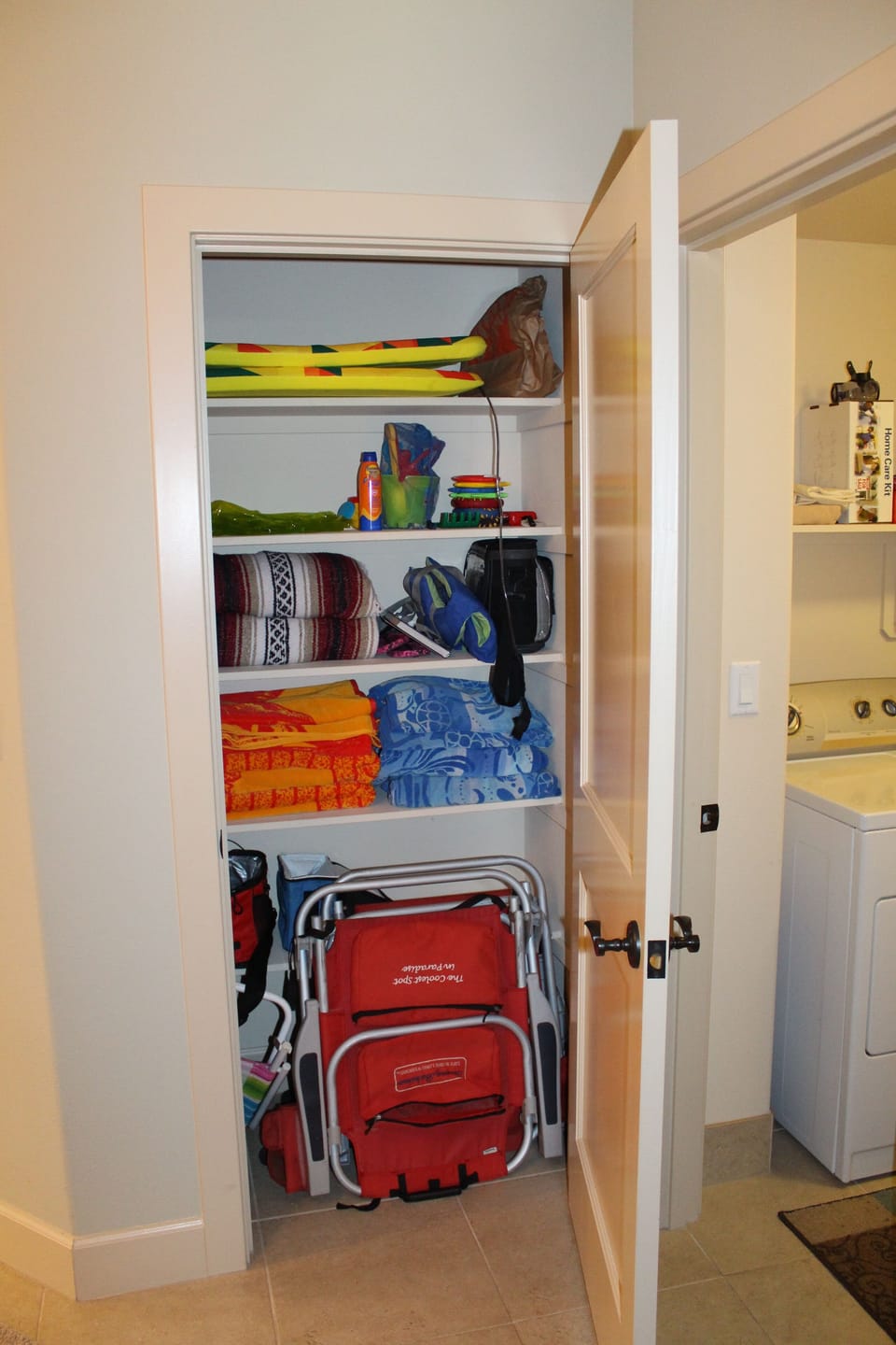 Foyer Closet with various beach items