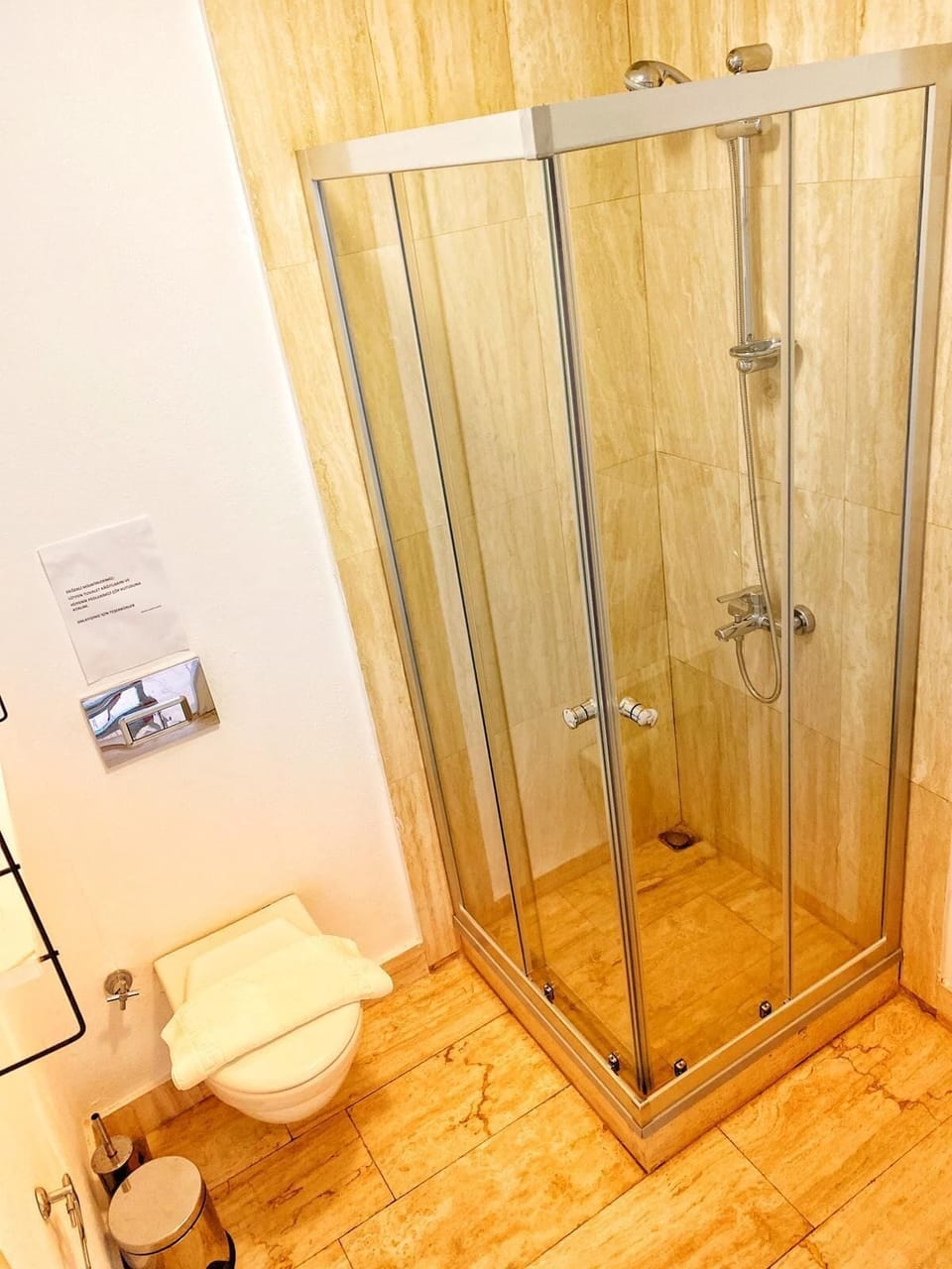Shower, free toiletries, hair dryer, slippers