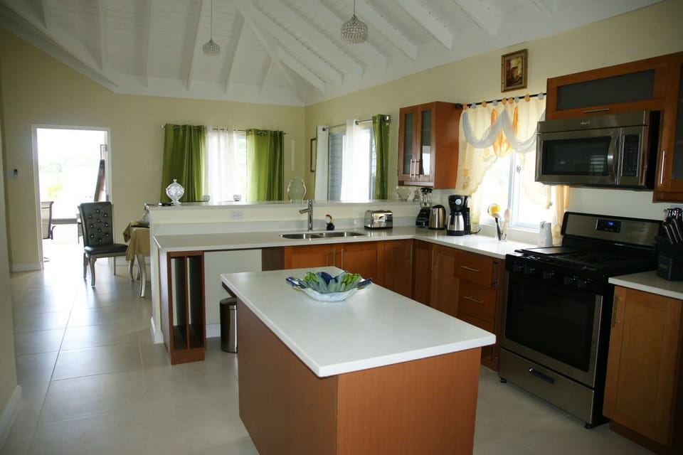 Family Villa, 2 Bedrooms, Kitchen, Ocean View | Private kitchen | Coffee/tea maker, full-size fridge, microwave, oven