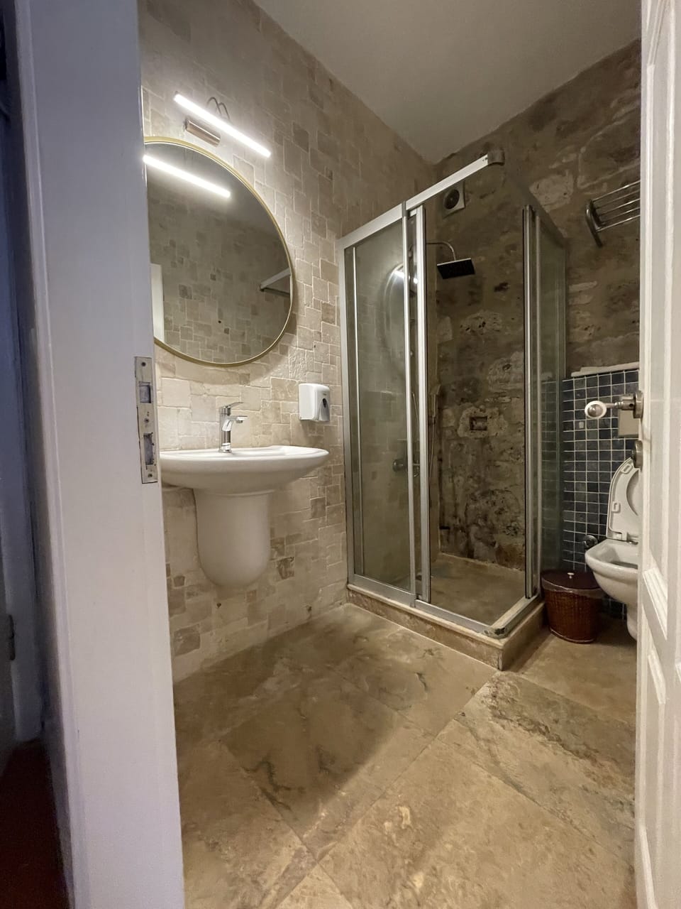 Shower, free toiletries, hair dryer, slippers