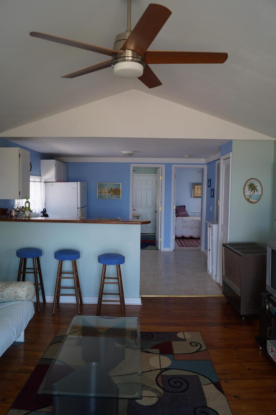 the living room/kitchen and the 2 bedrooms