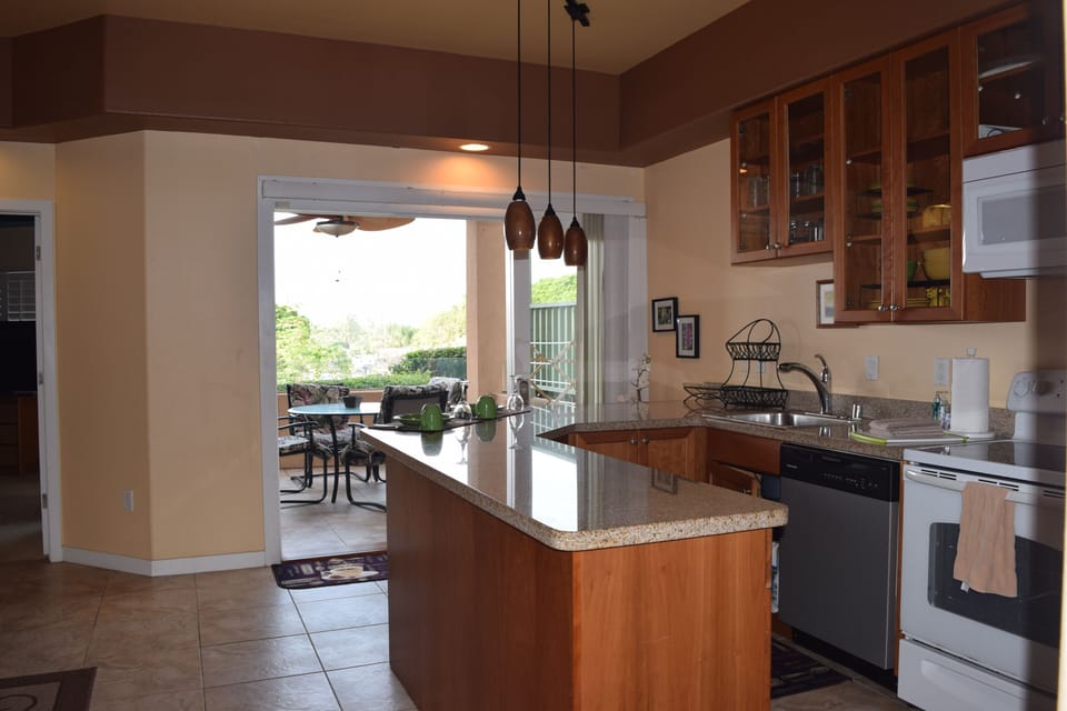 Kitchen & Dining Area Open Out to Lanai with Fabulous Ocean View.