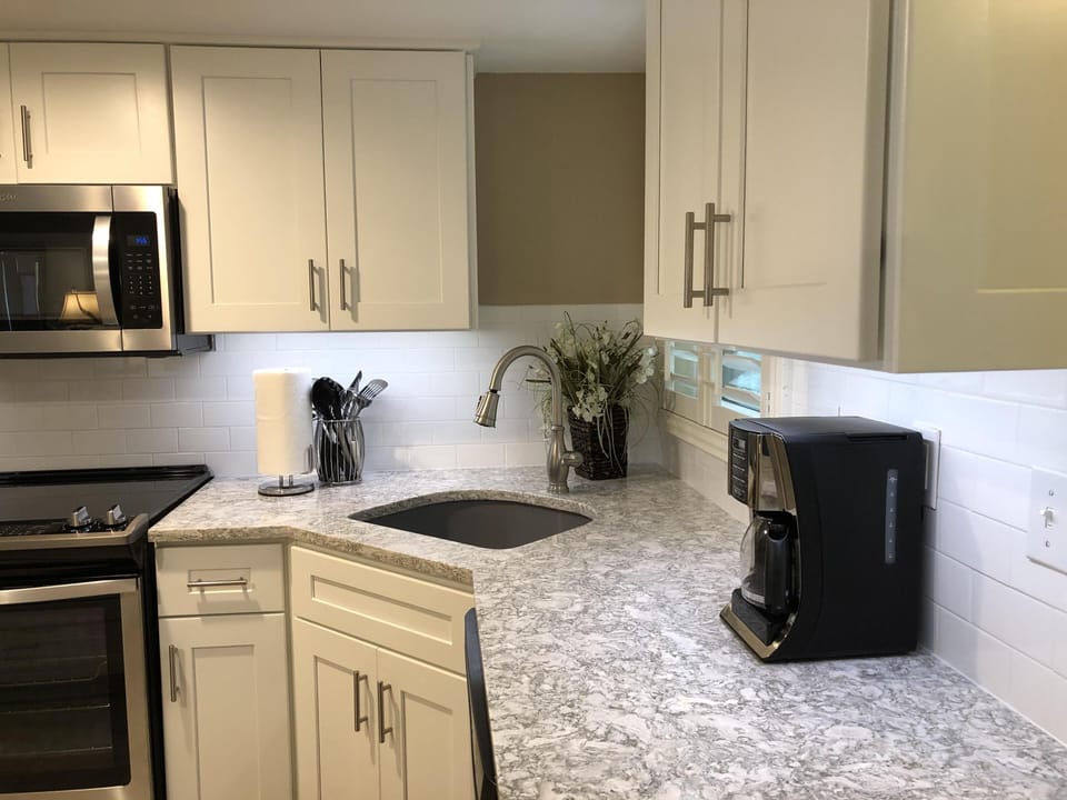 High-end Quartz countertops and granite sink