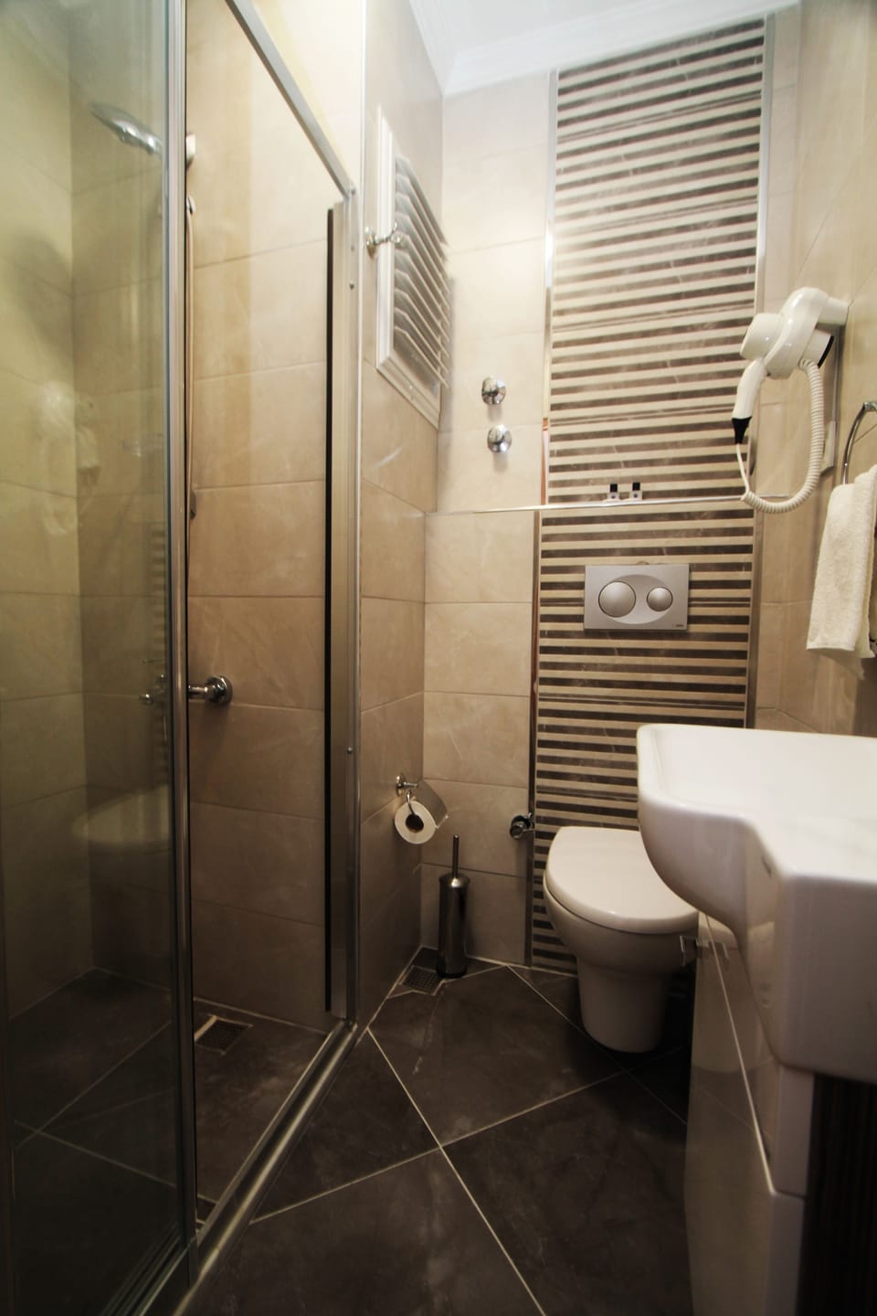Shower, free toiletries, hair dryer, slippers