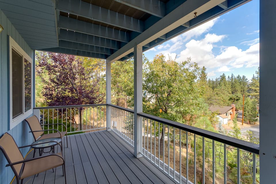 Lower deck with access from each bedroom looking NW towards lake & village