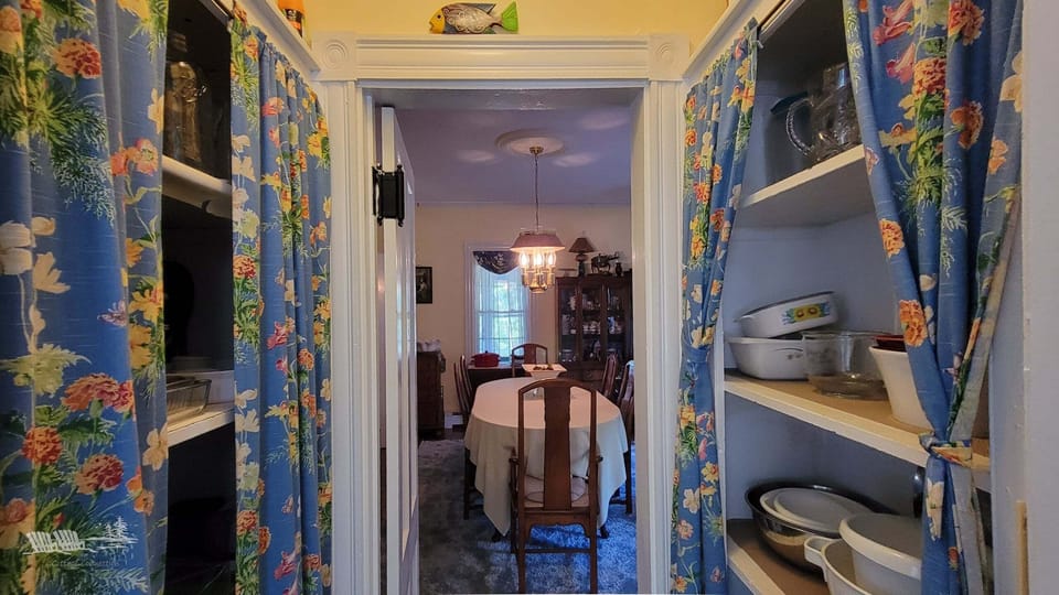 From the kitchen, through the pantry, to the dining room