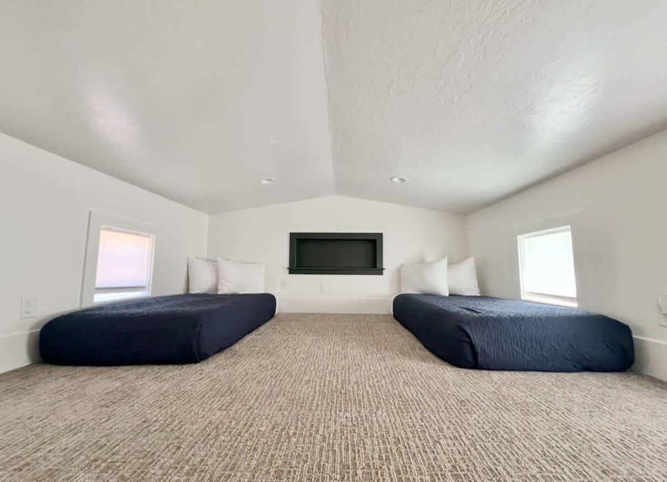 This is the loft area of your tiny home with two twin beds.