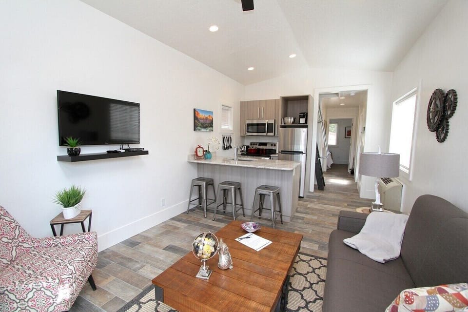 Your tiny home has everything you need including fast Wifi, flatscreen tv, king bed, loft area with twin beds and a fully stocked kitchen.