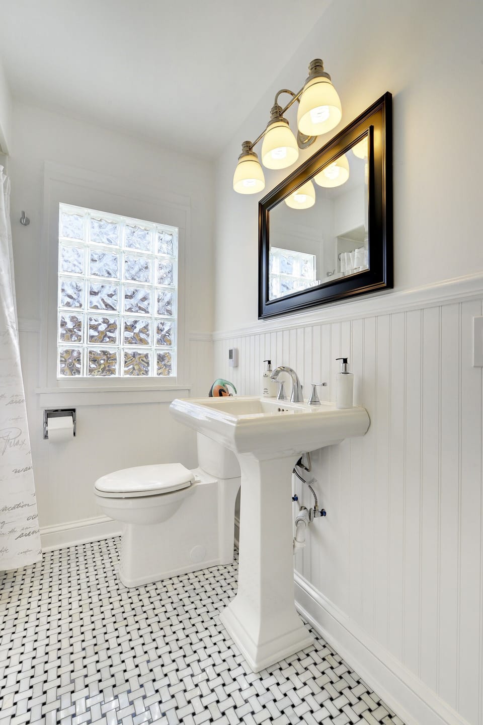Fully renovated bathroom with tub and shower