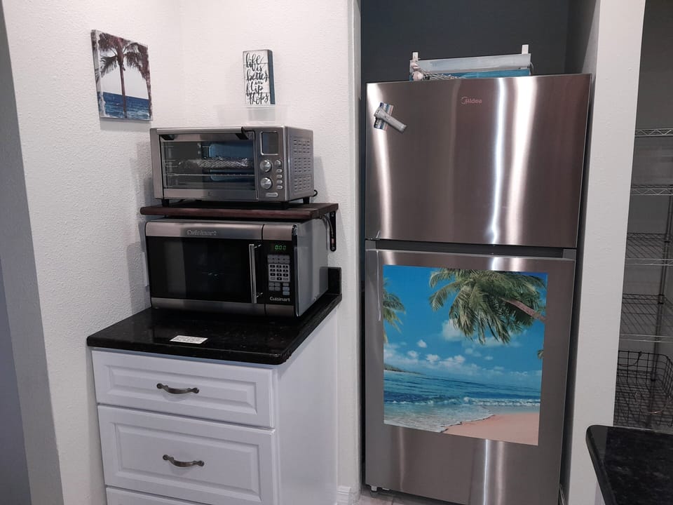 Microwave and Airfryer. Full fridge.