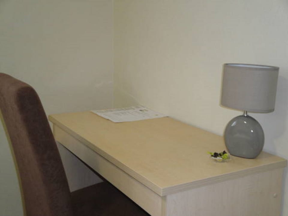 Desk, blackout drapes, soundproofing, free WiFi