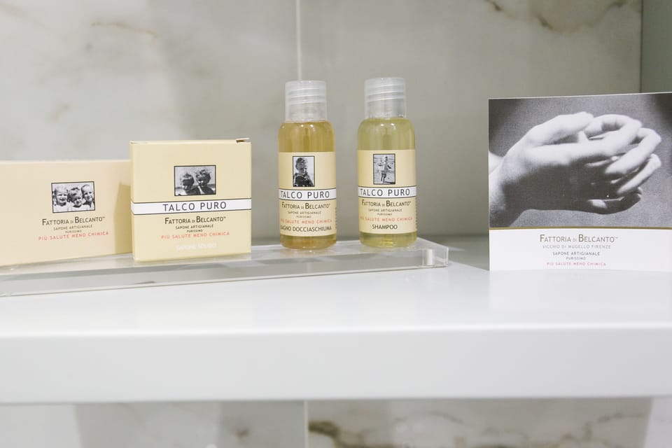 Junior Suite | Bathroom | Separate tub and shower, rainfall showerhead, designer toiletries