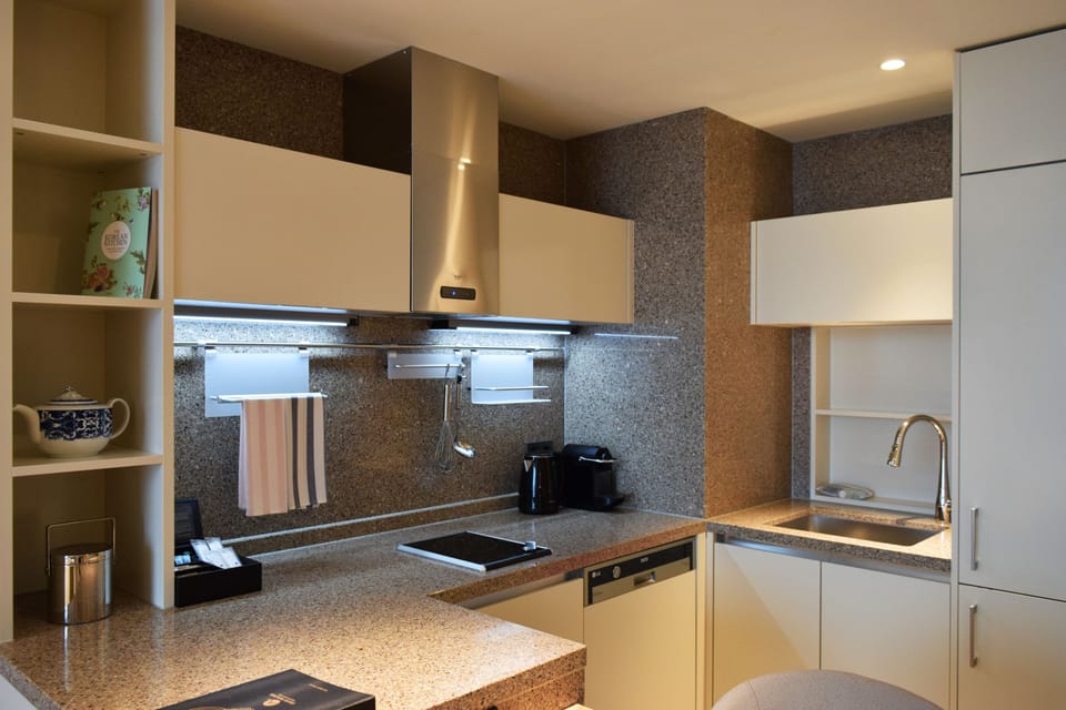 Junior Suite, 1 King Bed | Private kitchen | Coffee/tea maker, fridge, microwave, oven