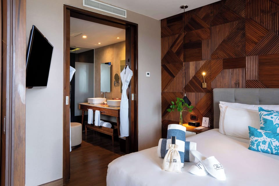 Suite, 1 Bedroom, Partial Ocean View | Premium bedding, minibar, in-room safe, individually decorated