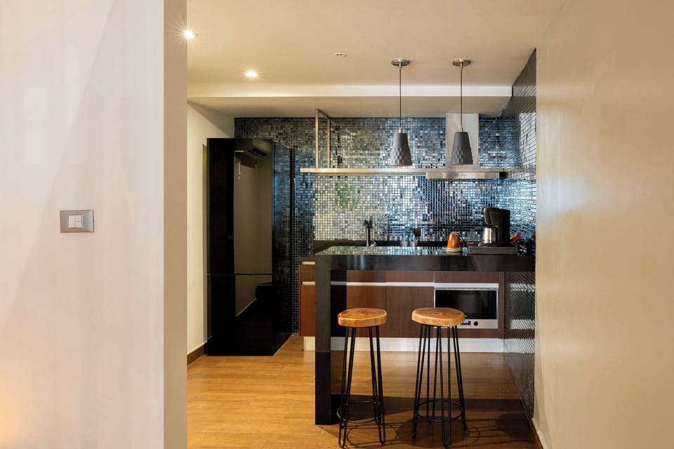 Suite, 1 King Bed (Mezzanine Residence) | Private kitchen | Microwave, coffee/tea maker