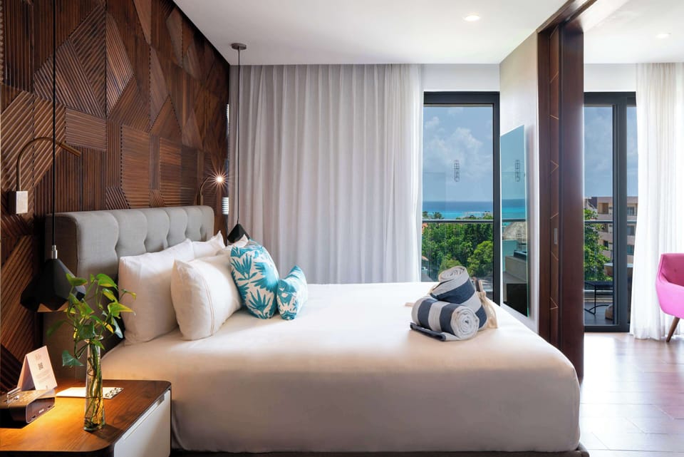 Suite, 1 Bedroom, Partial Ocean View | Premium bedding, minibar, in-room safe, individually decorated